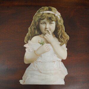 Antique Cut Out Little Girl in a Pink Dress Holding a Rose Bud Paper Ephemera